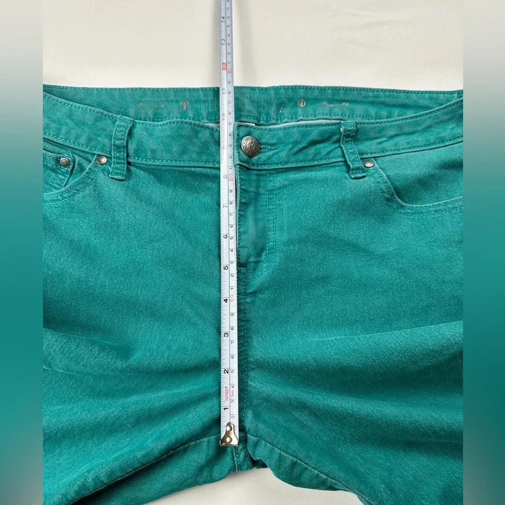 JLo straight jeans. Stretchy. Teal with zipper at ankle. Size 12